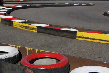 red and white tyres race track safety and security