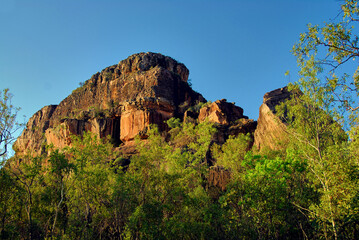 Eroded rock outcropping in the afternoon sun in the outback of the Northern Territory of Australia.