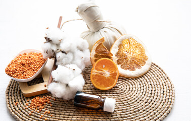 Spa composition with natural orange oil in a jar close up.