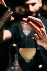 hand with cocktail