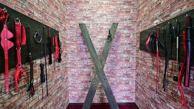 BDSM room equipped for role-playing games.