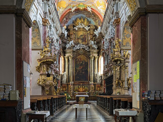 Fototapeta na wymiar Interior of Church of the Assumption of the Virgin Mary, also known as Jesuit Church, in Brno, Czech Republic. The church was built in 1598-1602 and modified in the 17th and 18th centuries.