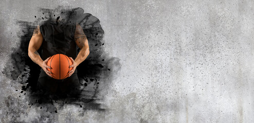 Basketball player on wall background