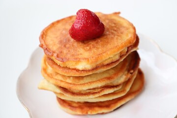 Sweet pancakes for breakfast with berries