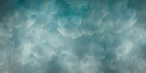 Fototapeta na wymiar Beautiful liquid blue abstract background with colored paint in water like clouds.