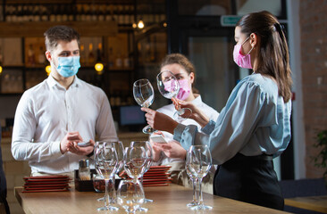 the manager trains the restaurant staff on the rules of customer service
