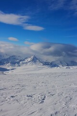 Fototapeta na wymiar Winter landscape of the mountains of the North Caucasus in the snow with clouds.