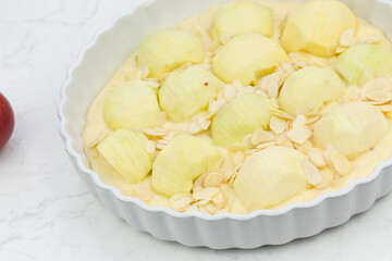 Apple pie with fanned apple in porcelain baking pan image series 14