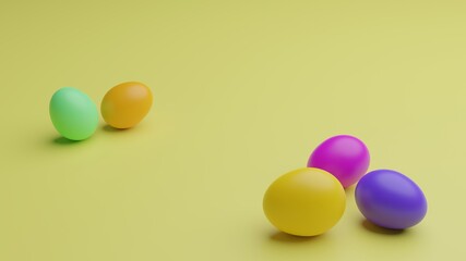 multicolored Easter eggs on yellow background