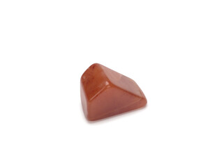 Polished gemstone cornelian, isolated on white background