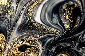 Obraz premium Golden Night. Treasury of art. Swirls of marble. Painting aesthetically mesmerizing. Abstract fantasia with golden powder. Extra special and luxurious- ORIENTAL ART. Ripples of agate. Natural luxury.