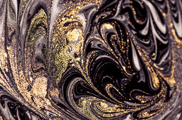 Golden Night. Treasury of art. Swirls of marble. Painting aesthetically mesmerizing. Abstract fantasia with golden powder. Extra special and luxurious- ORIENTAL ART. Ripples of agate. Natural luxury.