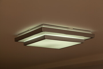 Square lamp on white ceiling