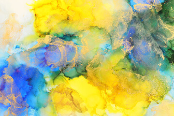 art photography of abstract fluid art painting with alcohol ink, blue, yellow and gold colors