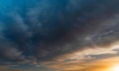 Naklejka na ściany i meble Beautiful sky after sunset with colorful clouds.Nature sky background. Dramatic sunset.