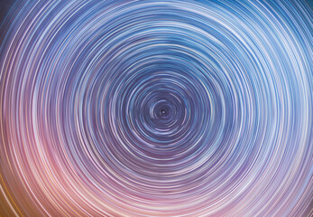 Beautiful starry sky with star trails orientation on the north star. Space background. Abstract...