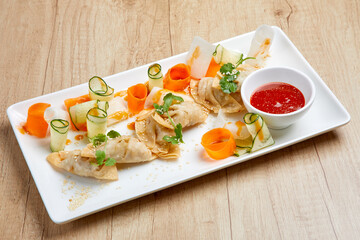 spring rolls with vegetables and sauce