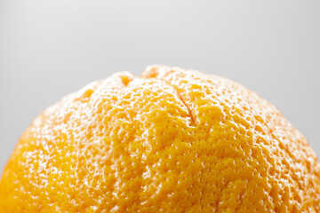 tangerine peel surface details close up macro image. mandarin skin texture close up details micro...
