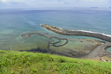 Twin Hearts Stone Weir” is site linked together by two heart-shaped scenic spots, archipelago of Taiwan. 