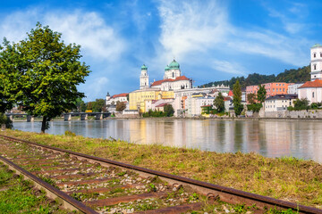 Cathedral, Buildings and Schaibling Tower on the side of Inn river in Passau, Germany