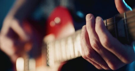 Guitarist playing electric guitar on stage - Powered by Adobe