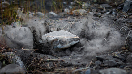 Obraz premium fallen stone on sand effect