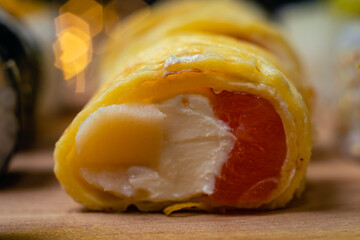 close-up of sushi food on wooden base with dark background for valentine's day dinner with selected focus cordoba argentina