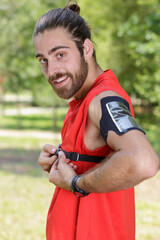 a jogger is posing outdoors