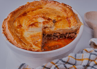 Homemade beef and onion pie.