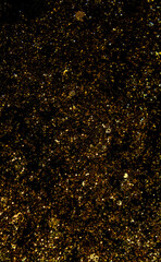 glitter golden stars on black background