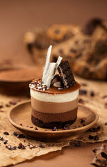 Mini chocolate cake on a wooden plate