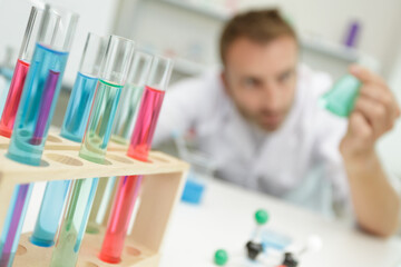 focused picture of laboratory tubes with liquid