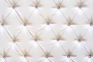 Bright upholstered sofa. Leather Sofa Texture , Leathers Upholstery Pattern. Light background furniture upholstery
