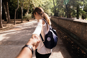 Woman holding her partner's hand
