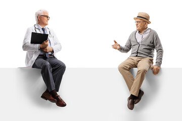 Mature doctor sitting on a blank panel and talking with an elderly man