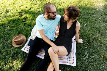 Photo of a couple looking at each other