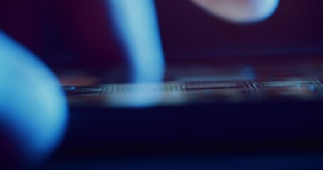 Finger scrolling smart phone screen macro close up - Powered by Adobe