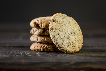 Pile of oat cookies on wooden table