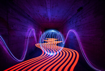 Light painted, colorful neon lights in tunnel