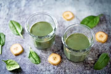 Spinach banana smoothie in a glass