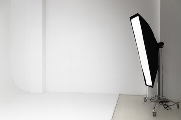 White photo studio interior background with light