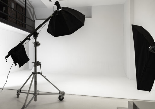 White photo studio interior background, impulse lights set