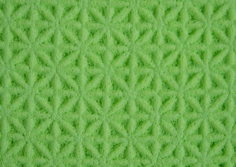 Green foam texture with outlines of stars.