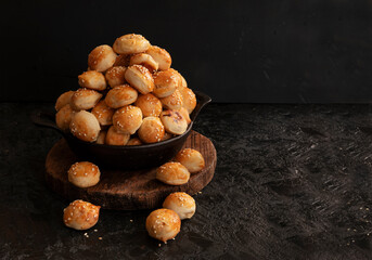 Basket with mini pies with different fillings. A lot of pies. Copy the space.