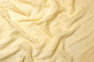 Yellow knitted background