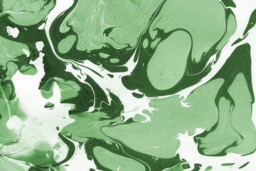 Green luxury marble ink texture on watercolor paper background. Marble stone image. Bath bomb effect. Psychedelic biomorphic art.