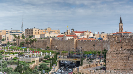 Fototapeta premium The wall of the Old City near the Jaffa Gate in Jerusalem. City landscape