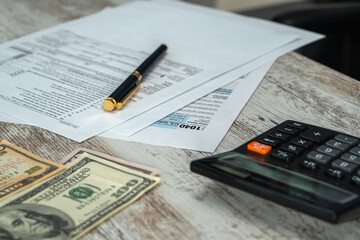 Obraz premium Tax form USA business income office concept. Tax Return Form 1040
