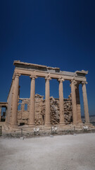 Vertical shot of the Caryatid Porch of the Erechtheion on the Acropolis, Athens
