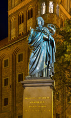 Monument to Nicolaus Copernicus at Market square in Torun.  Poland © Andrey Shevchenko